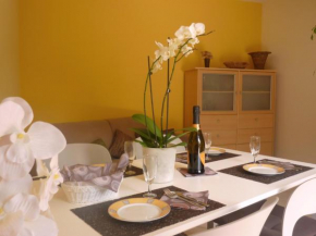 Ferienwohnung GALLO mit überdachter Terrasse Parkplatz 100 mtr z Strand